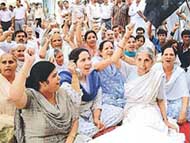 s Laxmi Kanta Chawla, a former BJP MLA, and other party workers stage a mandal-level dharna