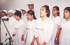 Students of the Institute for Blind, Sector 26, sing a song at the eye donation awareness programme held in Government Medical College and Hospital, Sector 32, Chandigarh, on Thursday.