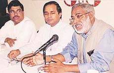The All-India Christian Council secretary general, Dr John Dayal, addresses a press conference with Bishop GM Mathayias and president Joseph D. Souza at Press Club, Chandigarh, on Wednesday.