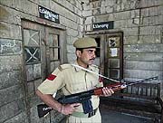 A policeman stands guard at a polling station