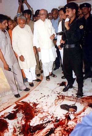 Deputy Prime Minister L. K. Advani and Gujarat Chief Minister Narendra Modi inspect  the blood-stained Exhibition Hall