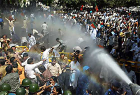 The police uses a water cannon on BJP workers during a demonstration near the Pakistan High Commission in New Delhi 