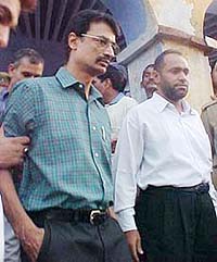 Suspended Inspector-General Ravi Kant Sharma, wanted by the Delhi police, surrenders in an Ambala court on Friday