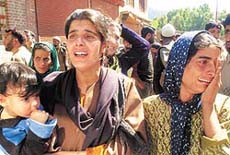 Relatives of Ghulam Qadir Bhat mourn his death after he was killed at Haihama in Kupwara district, 100 km north of Srinagar, on Wednesday.