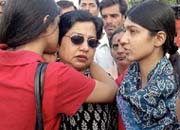 Mrs Madhu Sharma, wife of Ravi Kant Sharma, along with her daughters