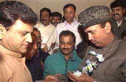 Ghulam Nabi Azad is greeted by partymen after being elected leader of the Legislature Congress Party in Srinagar