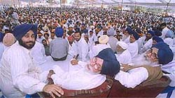 Mr Parkash Singh Badal, Mr Gurdas Badal and Mr Sukhbir Badal at a rally at Malout on Monday