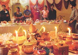 Students of the NIFD display different types of candles and gift items at a Divali exhibition