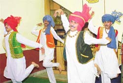 Students of Gupta Model High School present a cultural programme on the occasion of the foundation day celebration
