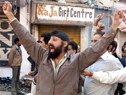 Protesters raise anti-Pakistan slogans during a demonstration in Jammu