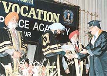 Punjab Chief Minister Amarinder Singh presents a certificate of merit