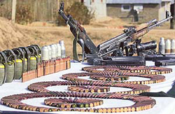 Arms and ammunition on display at an army camp in Uplona 