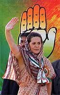Congress President Sonia Gandhi waves to the crowds