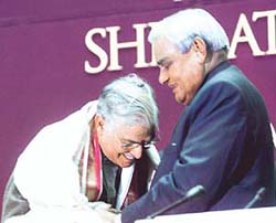 Prime Minister Atal Behari Vajpayee wishes Union HRD Minister Murli Manohar Joshi on his 70th birthday 