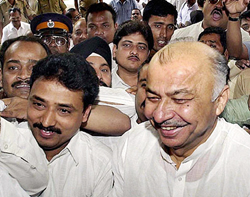 The newly appointed CLP leader, Mr Sushil Kumar Shinde, is greeted by his supporters 