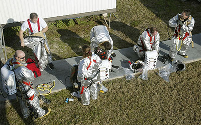 Kennedy Space Center firefighters take off their gear