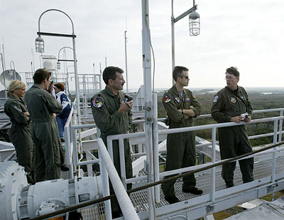 US Air Force search and medical rescue teams listen for information