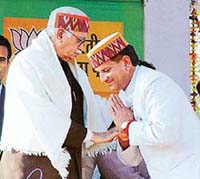 Mr Krishan Kapoor, BJP candidate, greets Mr L.K. Advani, Deputy Prime Minister, at a BJP election rally 