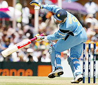 Indian batsman Harbhajan Singh is hit on the helmet from a bouncer from Australian paceman Brett Lee 