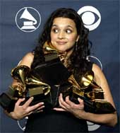 Singer Norah Jones poses for photographers