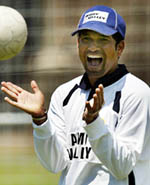 Sachin Tendulkar laughs during a practice session in Johannesburg on Sunday.