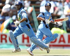 Sachin Tendulkar and Virender Sehwag watch the ball 