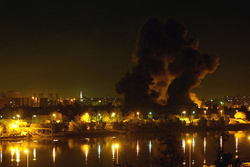 A missile hits a palace of Iraqi President Saddam Hussein during an air strike in Baghdad on Thursday. 