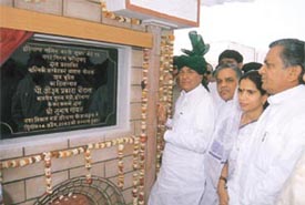 Haryana Chief Minister Om Prakash Chautala laying the foundation stone of Ambedkar Housing Scheme