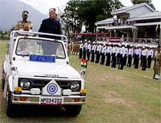 Chief Minister Virbhadra Singh inspects the parade on the occasion of Himachal Day at Dharamsala on Tuesday