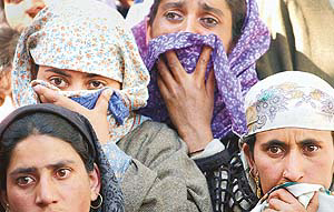 Relatives and local residents mourn the death of a J&K police personnel in Srinagar on Thursday after he was killed in an 