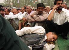 A man, who had come to Reasi to listen to Ms Sonia Gandhi on Saturday, sleeps at the venue