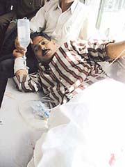 One of the persons injured in an explosion at Doda being shifted to Jammu Medical College Hospital for treatment.