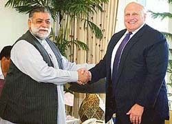 Pakistani Prime Minister Zafarullah Khan Jamali greets U.S. Deputy Secretary of State Richard Armitage at his residence in Islamabad on Thursday.