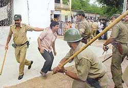 The police lathicharges a suspected bogus voter