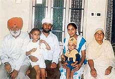 Surinder Singh along with his family