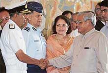 Chief of the Naval Staff Madhvendra Singh greets Mr Atal Bihari Vajpayee at IGI Airport 