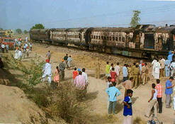 The charred engine and three coaches of the passenger train which caught fire between Ferozepore and Jalalabad on Wednesday