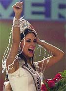 Miss Dominican Republic Amelia Vega celebrates