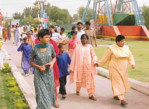 Inmates of the home of Missionaries of Charity, Sector 23, Chandigarh, enjoy their visit to Fun City in Panchkula