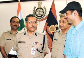 RENDEZVOUS WITH ANCHOR: Diwakar Pundir, anchor of Crime Patrol, ‘a real life’ action series, with Delhi Police Commissioner R. S. Gupta and other police officials at police headquarters in the Capital on Thursday.