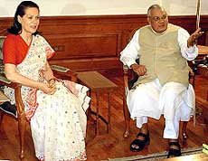 Congress President Sonia Gandhi with Prime Minister Atal Bihari Vajpayee at his residence in the Capital on Sunday