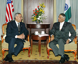 US Secretary of State Colin Powell talks with his Indian counterpart, Mr Yashwant Sinha, during their meeting in Phnom Penh on Wednesday.