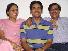 Parents of Ankit Jain rejoice at the success of their son, who stood 9th in the IIT-JEE, at their residence in Ludhiana on Friday. 