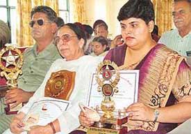 Dr Dharampal, Ms Suvarsha Kalra and Ms Nimita Sharma awarded at the National Seminar on role of media for the rehabilitation of disabled held at Punjab School Education Board