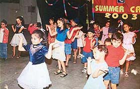 Students perform a western dance at the concluding function