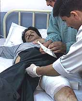 Doctors attend to Kashmirs Rural Development Minister Peerzada Mohammad Sayeed in a hospital in Srinagar 