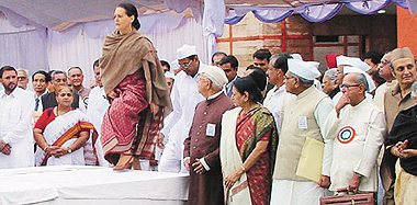 Ms Sonia Gandhi climbs to the dais, as Congress delegates watch, before addressing the Vichar Manthan Convention in Shimla on Monday.