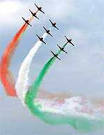 IAF planes release trails of smoke in the colours of the National Flag