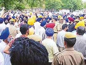 Akali workers protest outside Orbit Resort, Gurgaon, of Mr Sukhbir Singh Badal, son of former Punjab Chief Minister Parkash Singh Badal, when a team of the Punjab Vigilance Bureau reached there for searches on Sunday.