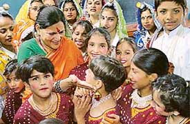 Ms Shobha Verma, wife of the UT Administrator, Justice O.P. Verma, shares some happy moments with children of Deaf and Dumb Vatika School, Sector 19